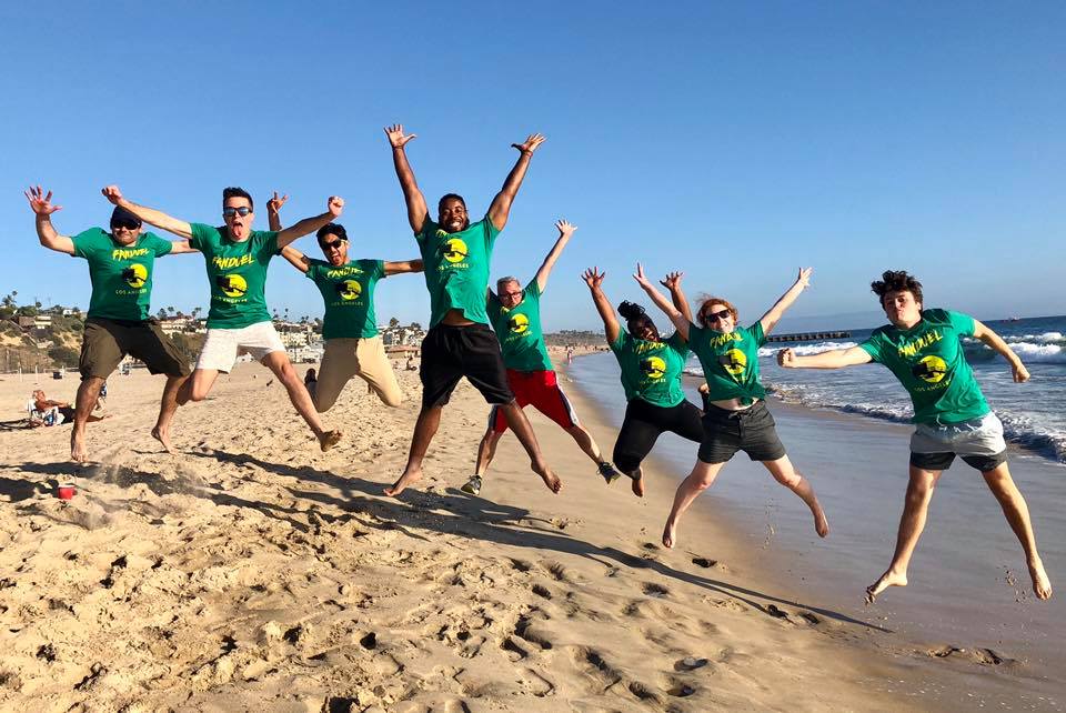 Photo of team on beach 